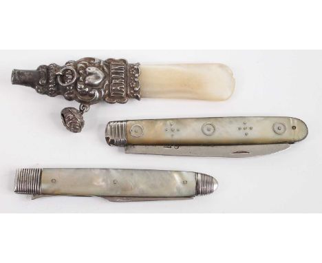A white metal and mother of pearl teething rattle, annotated Darling; together with a circa 1830 silver and mother of pearl p