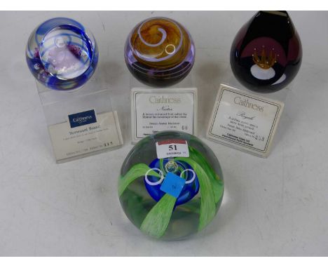 A Caithness limited edition oasis paperweight, No. 117/350, 10cm dia., together with three other Caithness limited edition pa