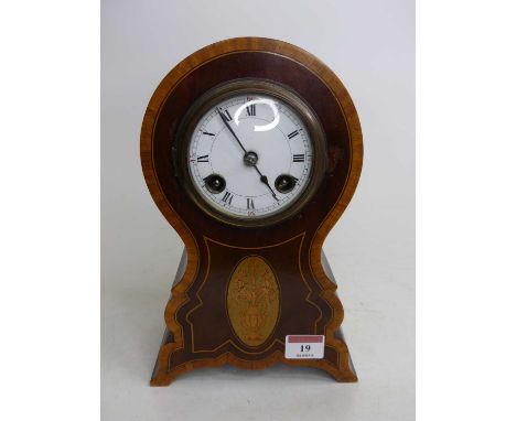 An Edwardian mahogany and satinwood crossbanded mantel clock, the enamel dial showing Roman numerals, having eight day moveme