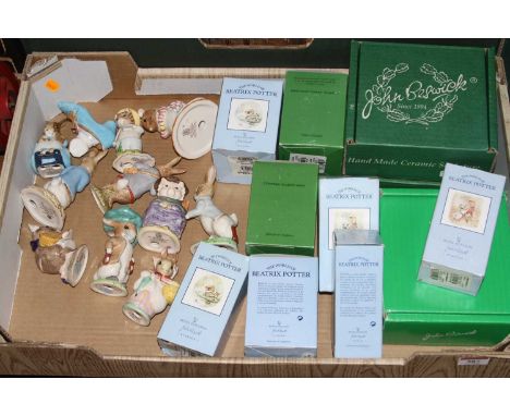 A collection of Beswick and Royal Doulton Beatrix Potter figures to include Peter Rabbit, And This Pig Had None, and Peter an