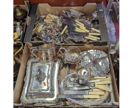 A collection of silver plated items to include a rectangular entree dish, twin handled sugar bowl, flatware etc 