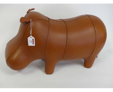 A leather clad footstool, in the form of a hippo, length 52cmCondition is good overall, no tears or stains, light signs of us