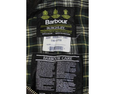 A Barbour Burghley waxed canvas trench coat, having corduroy collar, zip and button fastening, size 46"/117cm