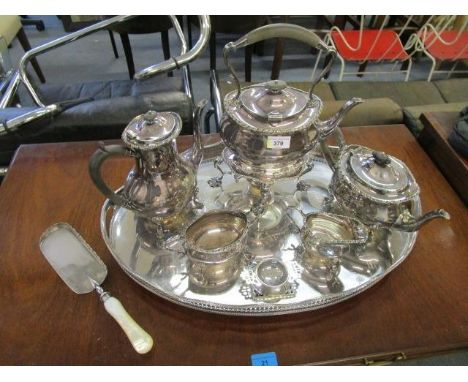 A Walker &amp; Hall silver plated five piece teaset to include a tea kettle on stand with burner, a silver plated gallery tra