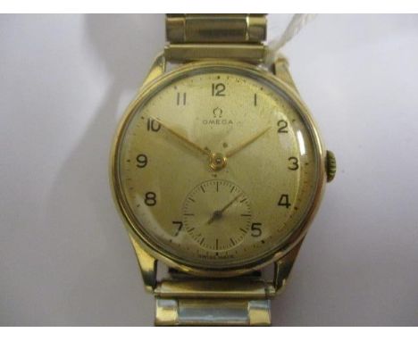 An Omega gents manual wind, 9ct gold, 1940s wristwatch.  The 15 jewel movement signed 10872864 and the case inscribed 13322 D