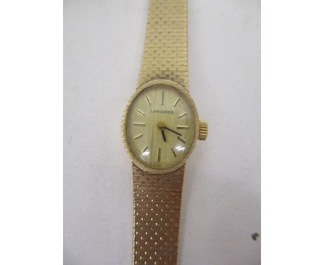 A Longines ladies, manual wind 9ct gold, 1970s wristwatch. The 17 jewel calibre 410 movement numbered 50666983m 26.8g, 15mm 