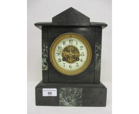 A late 19th century marble architectural form mantle clock having a white dial with Arabic numerals with a pierced, gilt cent