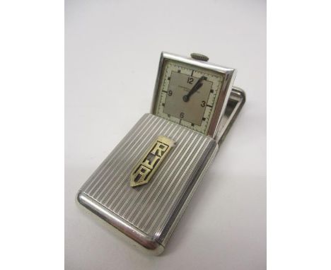 A Fortnum &amp; Mason manual wind, Art Deco Vertex, silver cased purse watch. The square dial having blued hands and Arabic n