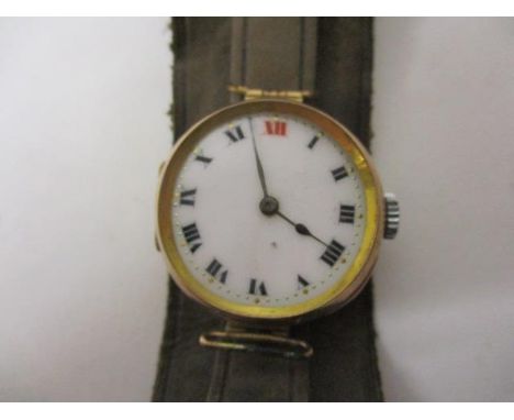 A Rolex ladies,  manual wind, 9ct gold early 20th century wristwatch. The white enamel dial having Roman numerals. The case i