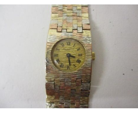 A Bueche Girod ladies, manual wind, 9ct gold wristwatch. The gilt dial having Roman numerals, the 17 jewel movement housed in