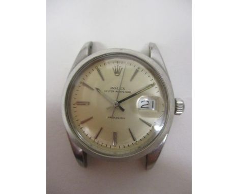 A Rolex Precision gents manual wind, stainless steel 1960s wristwatch. The later dial having date aperture at 3 and baton mar