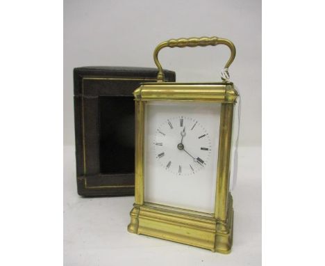 A late 19th/early 20th century carriage clock. The white enamel dial having Roman numerals and Breguet hands. The 8 day movem