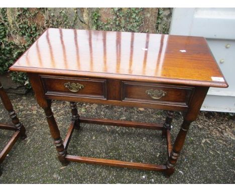 A good quality Crumpers of Salisbury, Georgian style oak side table with single inset drawers, 28 1/4"h x 30"w 