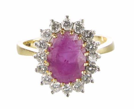 Ruby and diamond oval cluster ring, the central oval mixed cut ruby approx. 1.20ct, a cluster surround of 16 round brilliant 