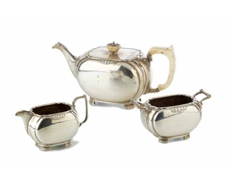 Mappin & Webb 3-Piece late art-deco tea service, hallmarked Sheffeild, 1939/1940, cushion shaped curved fluted design to back