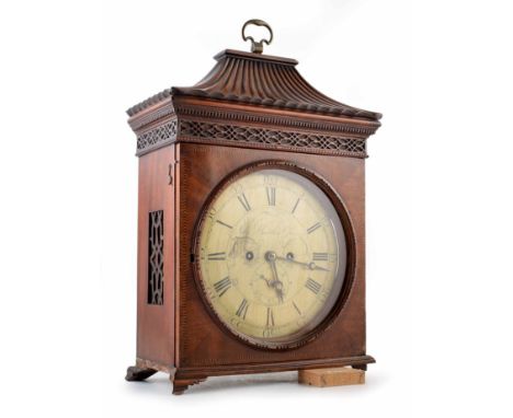 A late 18th century mahogany bracket clock with Chinese Chippendale style case and blind fretwork. Silvered dial with Roman a