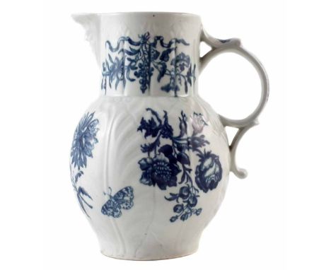 Worcester mask jug circa 1780, printed with natural sprays in underglaze blue, crescent mark to base,  23cm high      For con