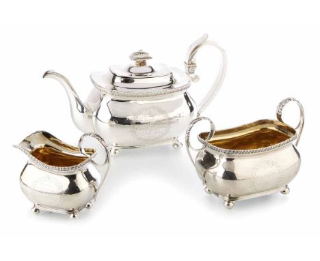 3-piece silver tea set, of cushion shape on 4 bun feet, plain with inscription cartouche to each piece, engraved 'Present fro