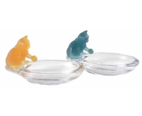 Two Daum dishes, applied with coloured glass kittens playing with balls, etched signatures to sides, 17cm wide.     For condi