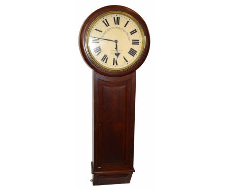 An oak and mahogany London & North Western Railway wall clock. Cream enamel dial with Roman numerals and single train, eight-
