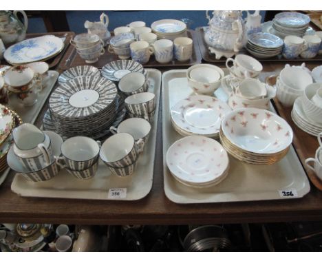 Two trays of assorted china to include Crown Staffordshire black and white part tea ware, items comprising cups, saucers, mil