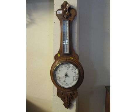 Late Victorian oak aneroid wheel barometer.