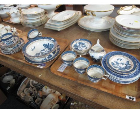 Two trays of Booths Real Old Willow part dinner ware items comprising cups, saucers, various plates, milk jug, sucrier, bowl 