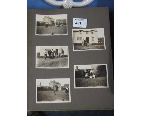 Album of early 20th Century photographs, mainly family groups and portrait studies, also including cars, ships and railways. 