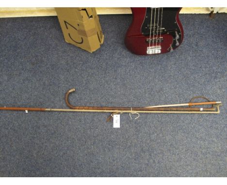 Silver mounted malacca walking cane, long coaching type whip and small riding whip.
