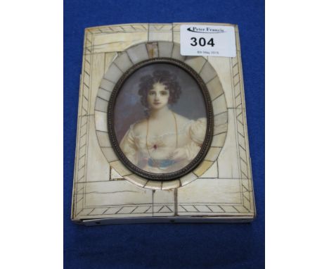 Early 20th Century Italian portrait miniature of a young woman in 19th Century dress, in piano key ivory frame. CONDITION REP