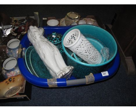 Basket of assorted china to include large Staffordshire seated spaniel, Persian design pottery items to include plates, large