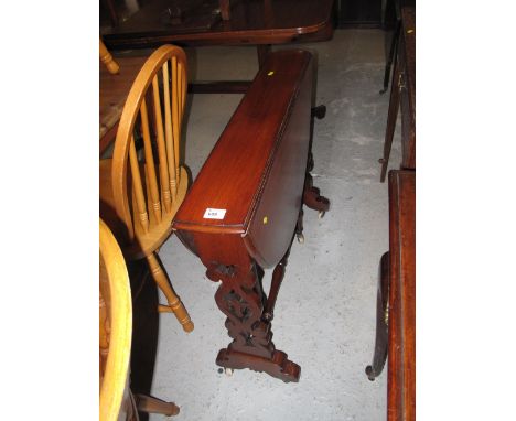 Victorian mahogany oval Sutherland table with pierce lyre ends and ceramic castors.