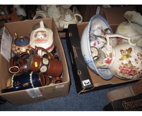 Two boxes of assorted china to include floral and other teapots, continental floral part tea ware, large baluster floral jugs