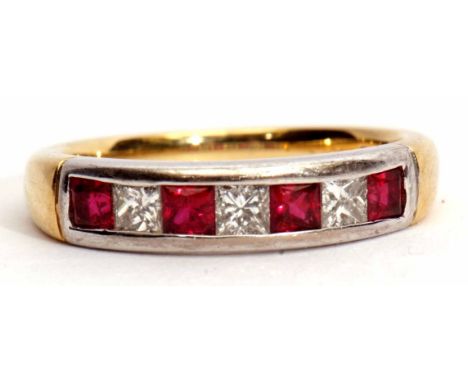 An 18ct gold, princess cut ruby and diamond half-eternity ring featuring three princess cut diamonds in channel setting, spac