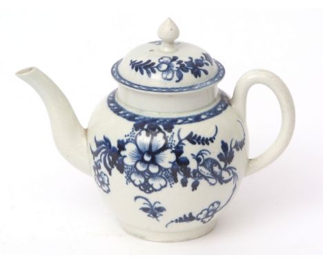 Liverpool (James Pennington) teapot and cover, circa 1770, painted in underglaze blue with floral sprays and a bird in a bran