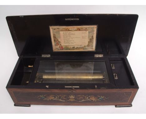 Late 19th century Swiss music box, No 31373 playing 12 airs of typical hinged form with cross-banded and line inlaid cover an