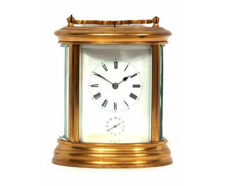 Late 19th century French gilt and lacquered brass oval carriage alarm clock, with push repeat, 794, the large silvered lever 