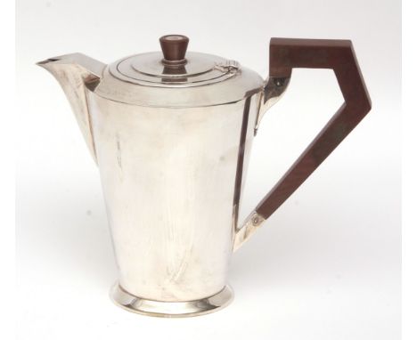 George VI hot water pot, in the Art Deco manner, with hinged cover, tapering polished body and stylised Bakelite finial and h
