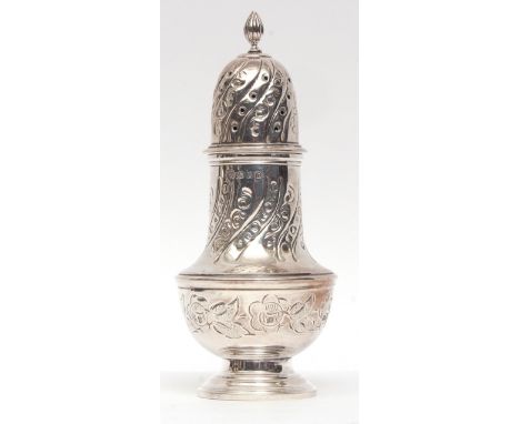 Elizabeth II table caster with pierced pull off cover and cast finial to a foliate embossed body on spreading circular foot, 