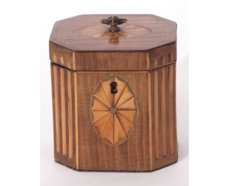 Sheraton style mahogany small tea caddy of octagonal form, inlaid with typical roundels, void interior, circa early 19th cent
