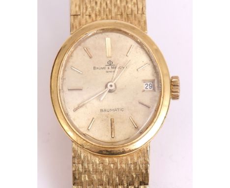 Late 20th century Swiss 18ct gold automatic centre seconds calendar wrist watch, Baume &amp; Mercier, Baumatic, the 17-jewel 