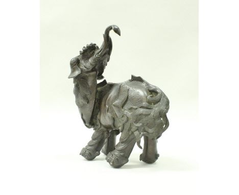 A late 19th/early 20th Century Chinese censer in the form of an elephant, his head turned looking behind CONDITION REPORTS Ha
