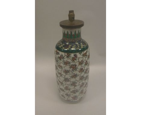 A Chinese polychrome decorated vase with cracked ice and floral design, bears underglazed blue concentric ring mark (drilled 