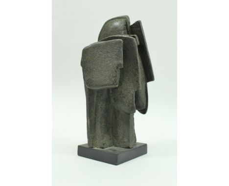 PETER HAYES (b. 1946) - a ceramic sculpture depicting numerous heads in profile, mounted on a slate base, unsigned, approx 28