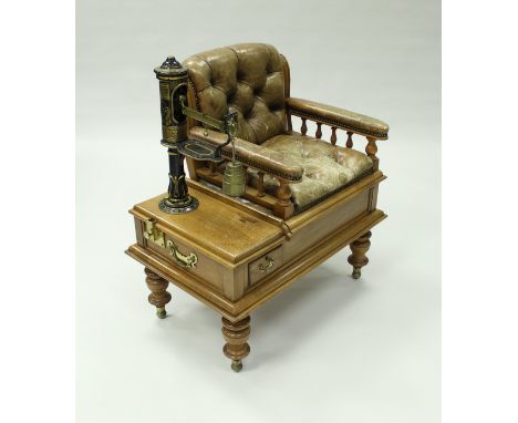 A set of Victorian walnut and buttoned leather upholstered jockey scales with black painted and gold decorated metalwork by W