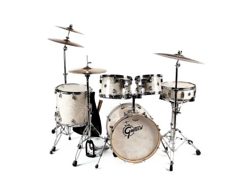 A Gretsch Catalina Club drum kit, with Evans '56 Calftone skins, 19" bass drum, 14" floor tom, snare, two toms, high-hat, cym