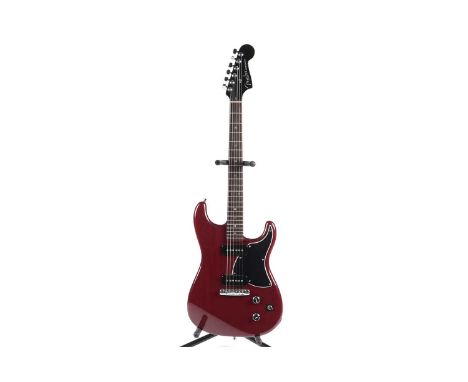 A Fender USA Strat-o-Sonic, serial number Z3xxxx13, with black headstock, fitted with two P90 pickups, red mahogany body.
