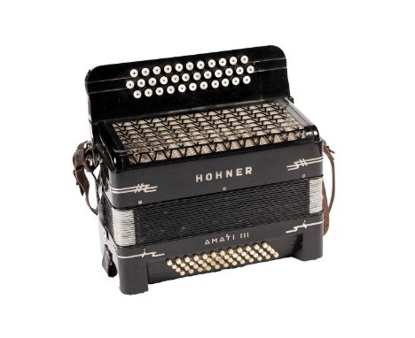 A Hohner Amati III 48-bass button accordion with 34-treble buttons, cased.