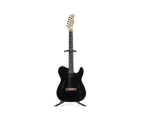 A Fender Japan Tele-Acoustic Thinline, serial number AOxxxx0, black finish, fitted with single pickup, moulded Fender Case.No