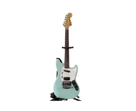 A Fender Japan Mustang, serial number V0xxx98, with maple and rosewood neck, Dynamic Fender Vibrato, Seymour Duncan neck pick